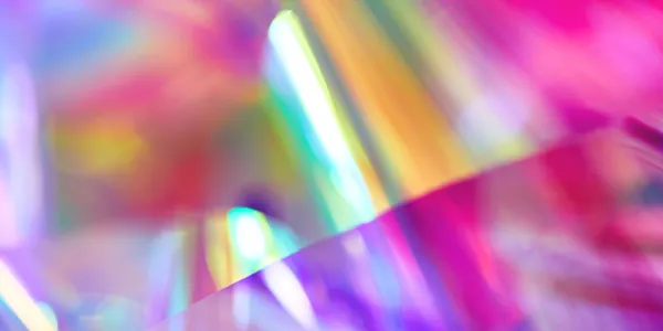 Rainbow event banner with glittery vibes and dancing crowd